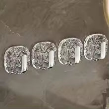 Pack of 4 self adhesive wall hooks transparent design for easy mounting and strong hold