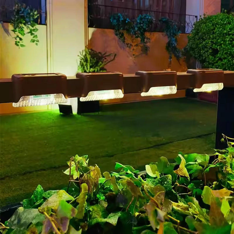 Clarify.pk pack of 4 solar led staircase lights outdoor mounted on railing illuminating garden path