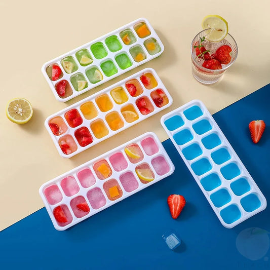 14 grid silicone ice cube mold by Clarify.pk filled with colorful fruit pieces for ice making