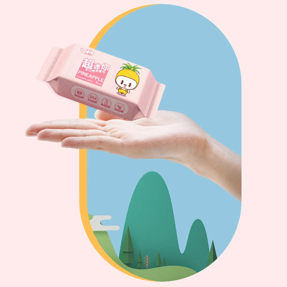 Clarify.pk 64 pcs New Soft Baby Wet Wipes pineapple scent pack held above a hand
