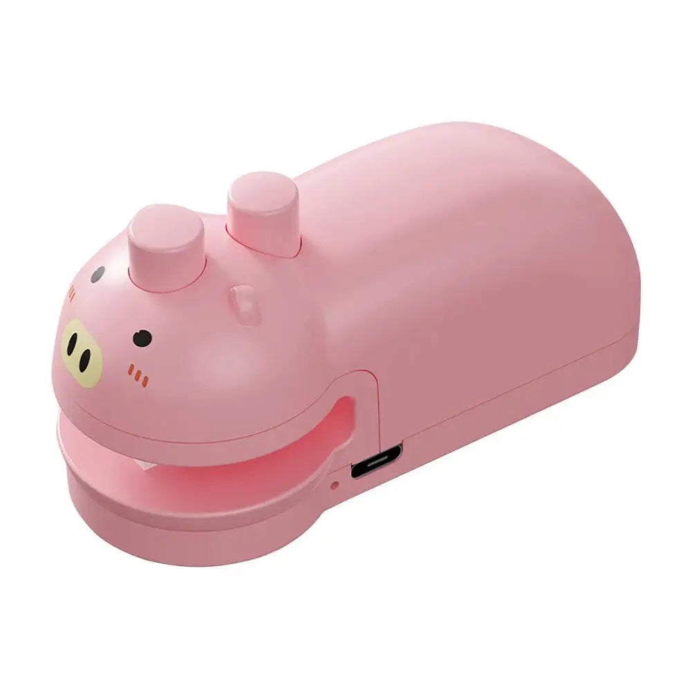 Pink handheld food sealing device with cute pig face design and USB charging port