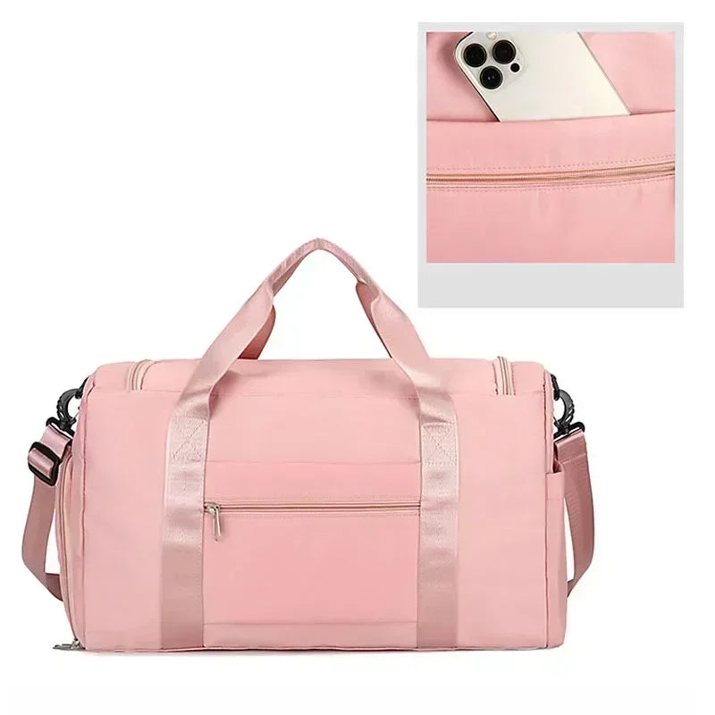 Pink large capacity travel bag with multiple compartments and adjustable shoulder strap