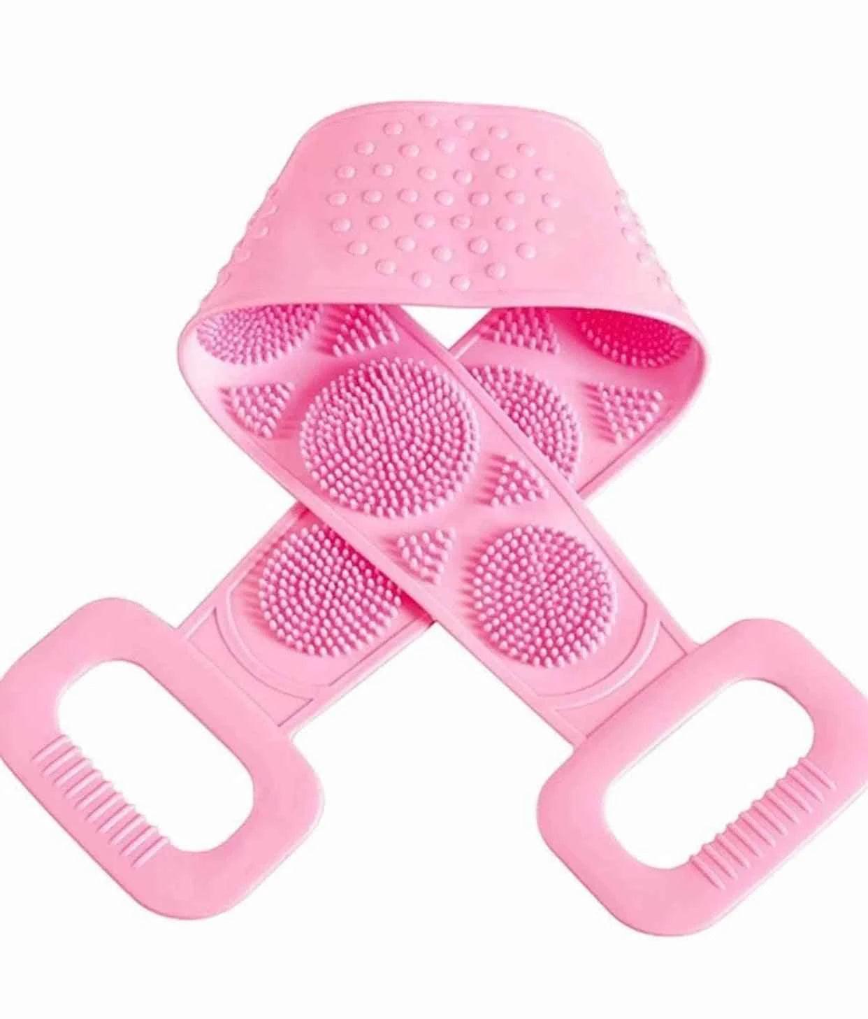 Pink silicone body scrubber with dual handles and textured bristles for exfoliating and cleansing