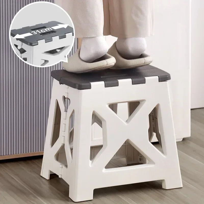 Plastic foldable chair for home use in white and black with sturdy design and 31 cm seat size