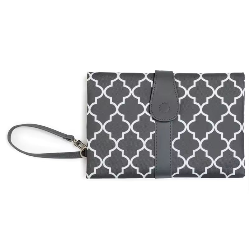 Clarify.pk waterproof baby changing mat with black and white geometric pattern and wrist strap