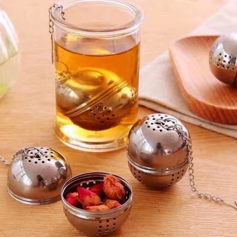 Stainless steel tea leaves diffuser ball set with chain for steeping loose tea in glass cup
