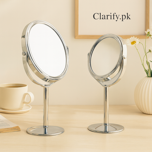Clarify.pk pocket size metal mirror with round double-sided reflective surfaces on adjustable stands