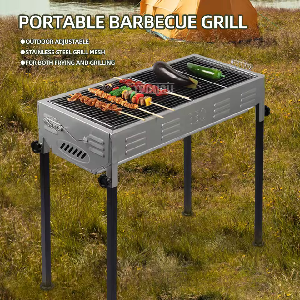 Portable barbecue grill for outdoors with stainless steel grill mesh and adjustable legs cooking skewers and vegetables