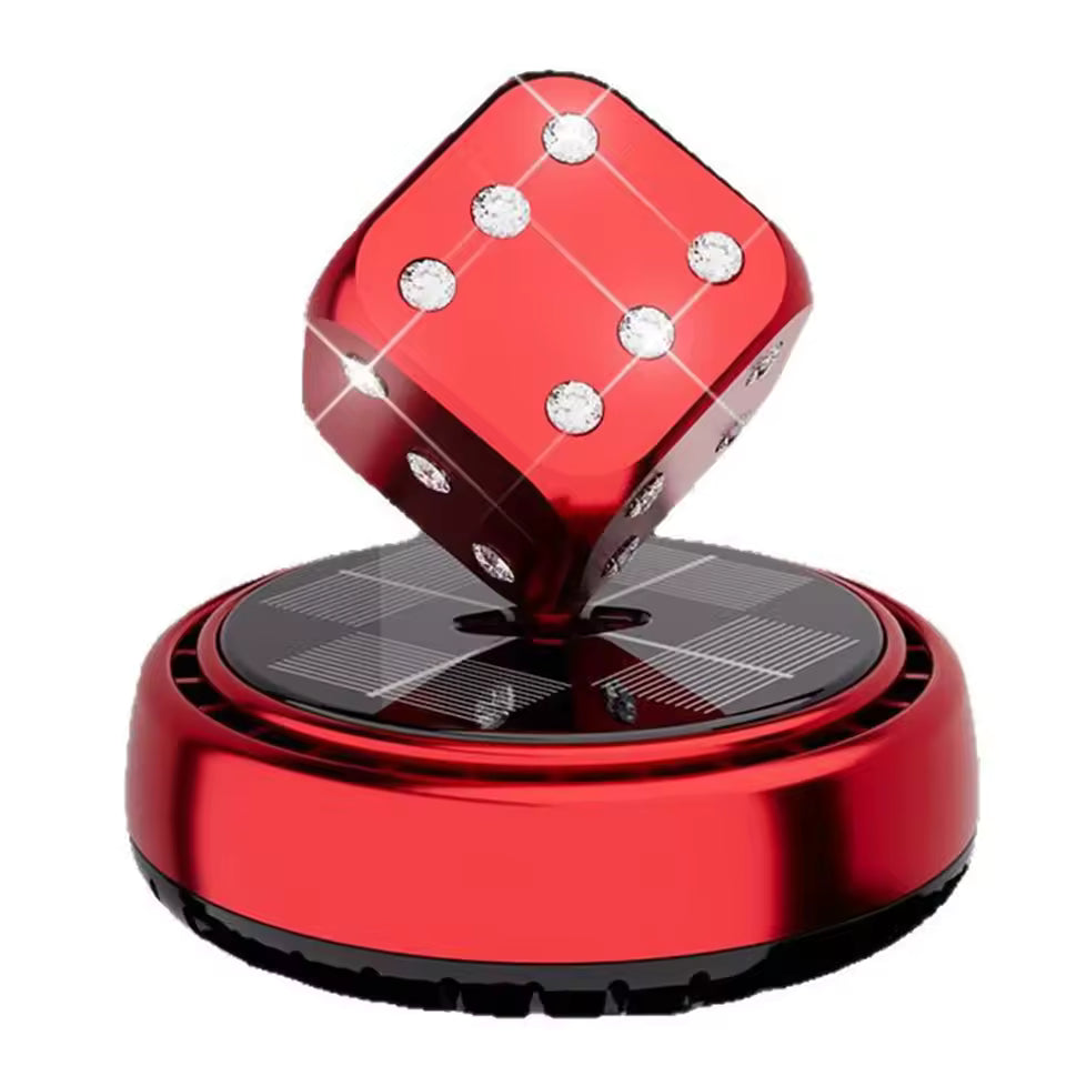Red portable car air purifier with a spinning dice design and solar panel base by Clarify.pk
