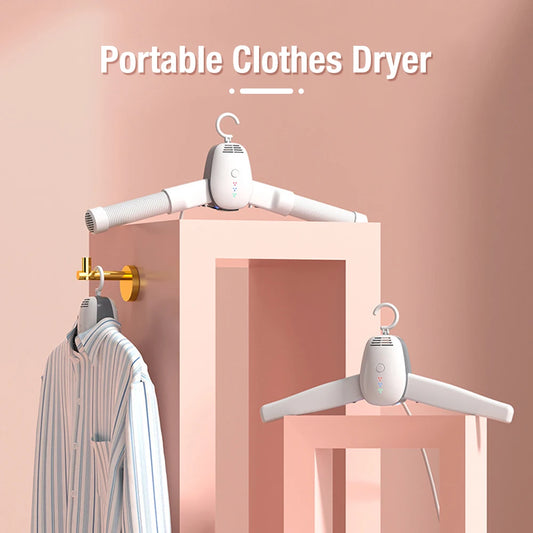 White portable clothes dryer with extendable arms for drying shirts in small spaces