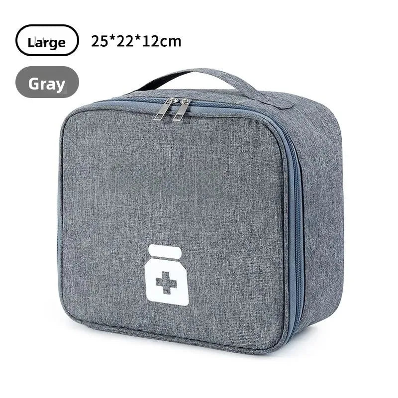 Gray portable first aid kit bag with zipper and handle for easy carrying