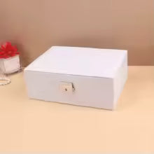 White portable jewelry box for girls with secure lock and compact design by Clarify.pk