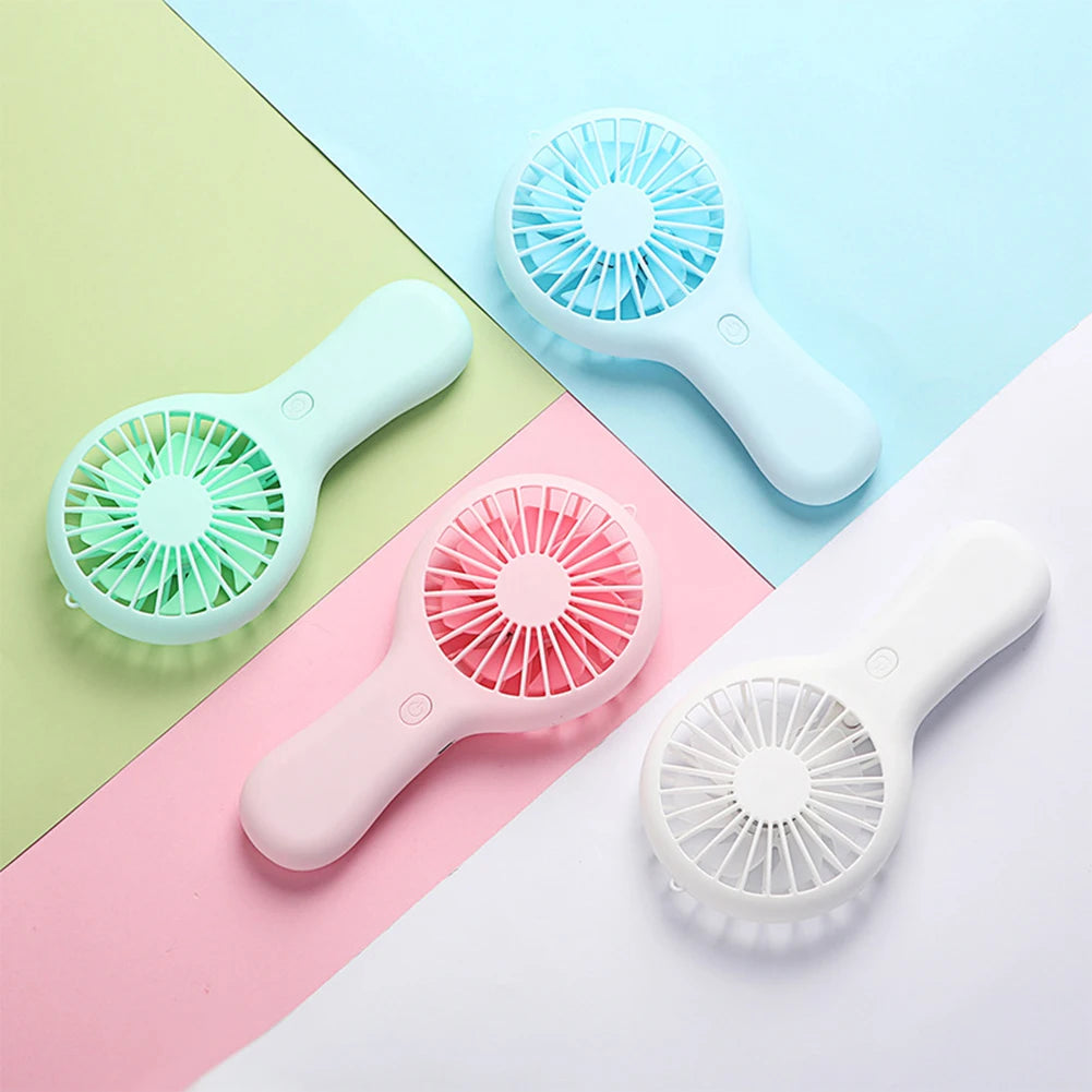 Clarify.pk portable mini fan USB rechargeable in pastel colors blue green pink and white