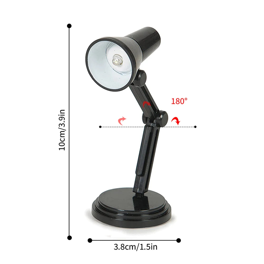 Black portable mini night light with adjustable arm and round base measuring 10 cm height