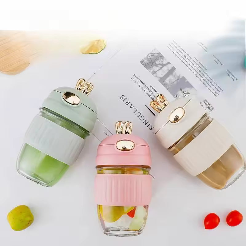 Clarify.pk portable rabbit water bottle in green pink and white with cute bunny ears design