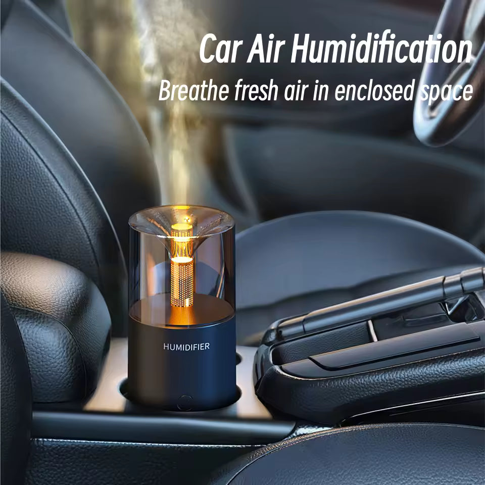 Portable USB aroma humidifier in car cup holder emitting mist for fresh air in enclosed space