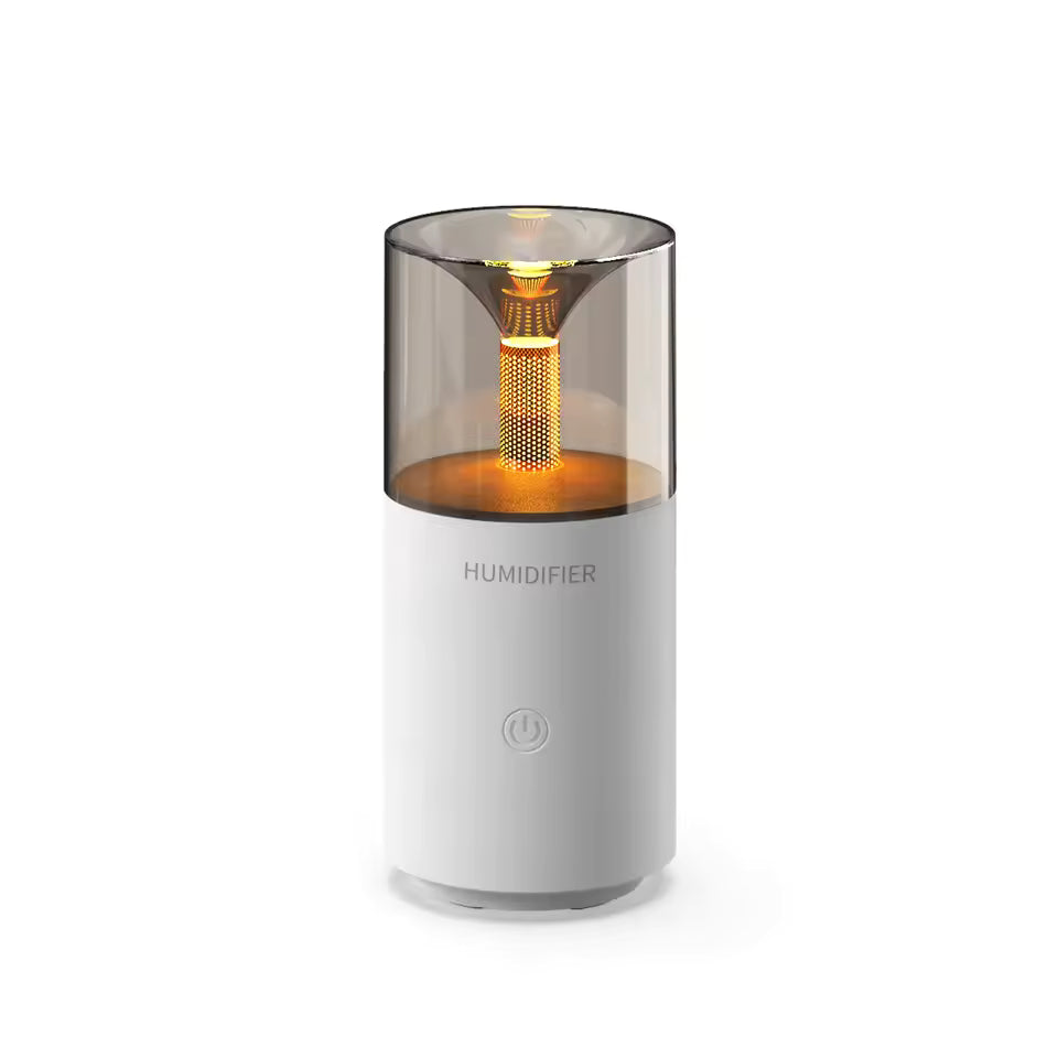 Clarify.pk portable USB aroma humidifier with sleek white base and amber light for home use