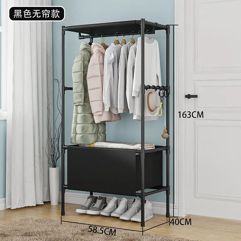 Clarify.pk black folding rack used as a portable wardrobe closet with hanging clothes and shoes organized