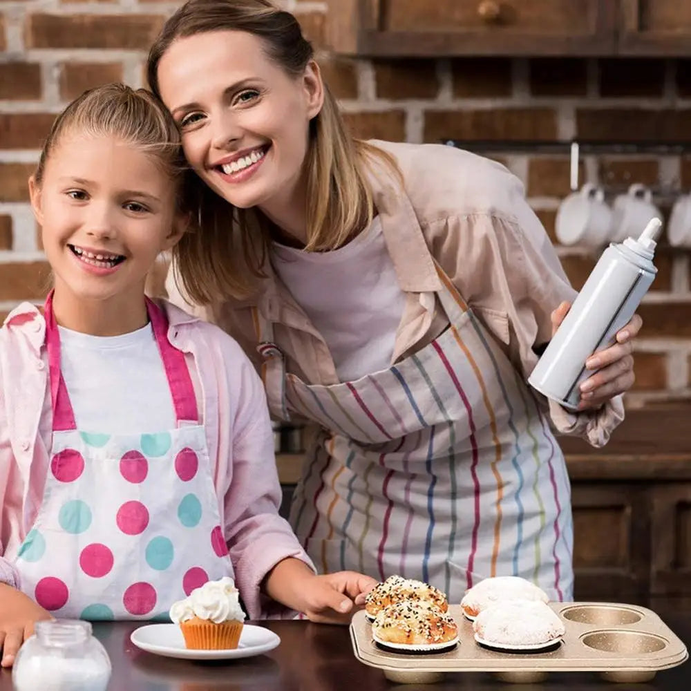 6 cup cupcake baking tray from Clarify.pk with freshly baked cupcakes held by smiling woman and child in kitchen