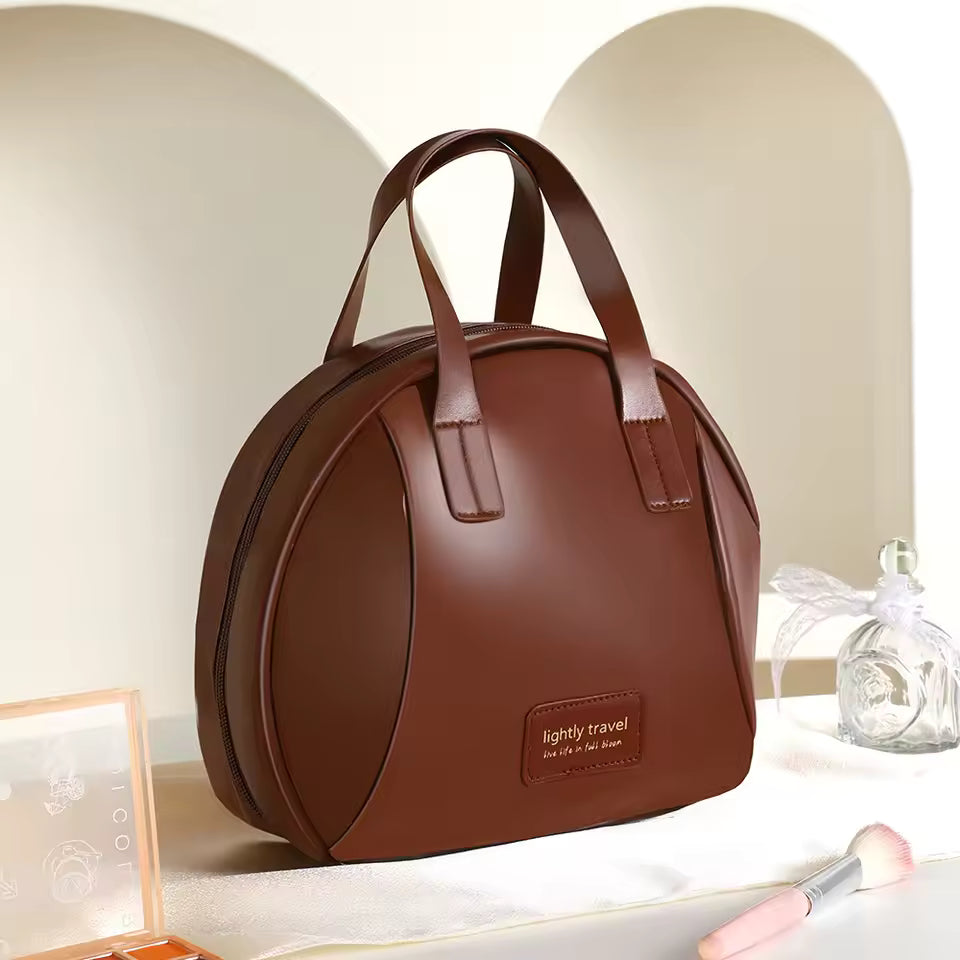 Brown PU leather cosmetic bag for women with dual handles and travel label on front