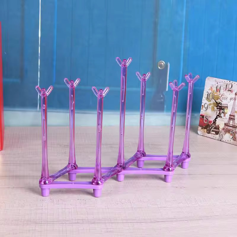 Clarify.pk purple glass cup drying rack with multiple holders for efficient kitchen storage
