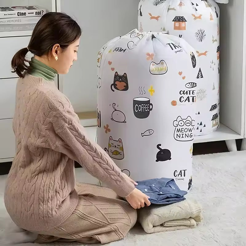 Clarify.pk quilt storage bag for clothes with cute cat prints holding folded clothes
