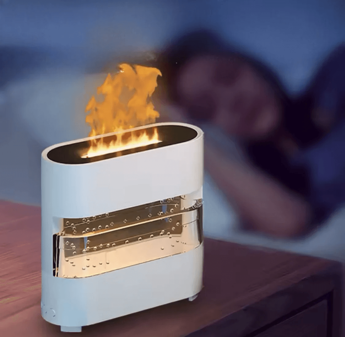 Clarify.pk white rain effect humidifier with water mist and warm light on wooden table near sleeping person
