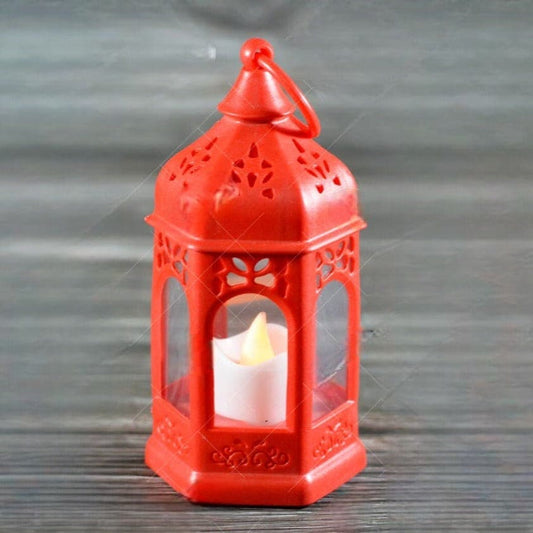 Red Ramadan lantern lamp with a decorative design and a flickering LED candle inside