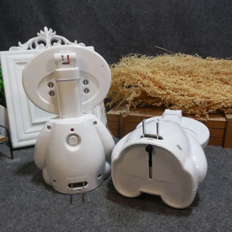 White rechargeable study lamp with eye protection shown from back and side on gray surface