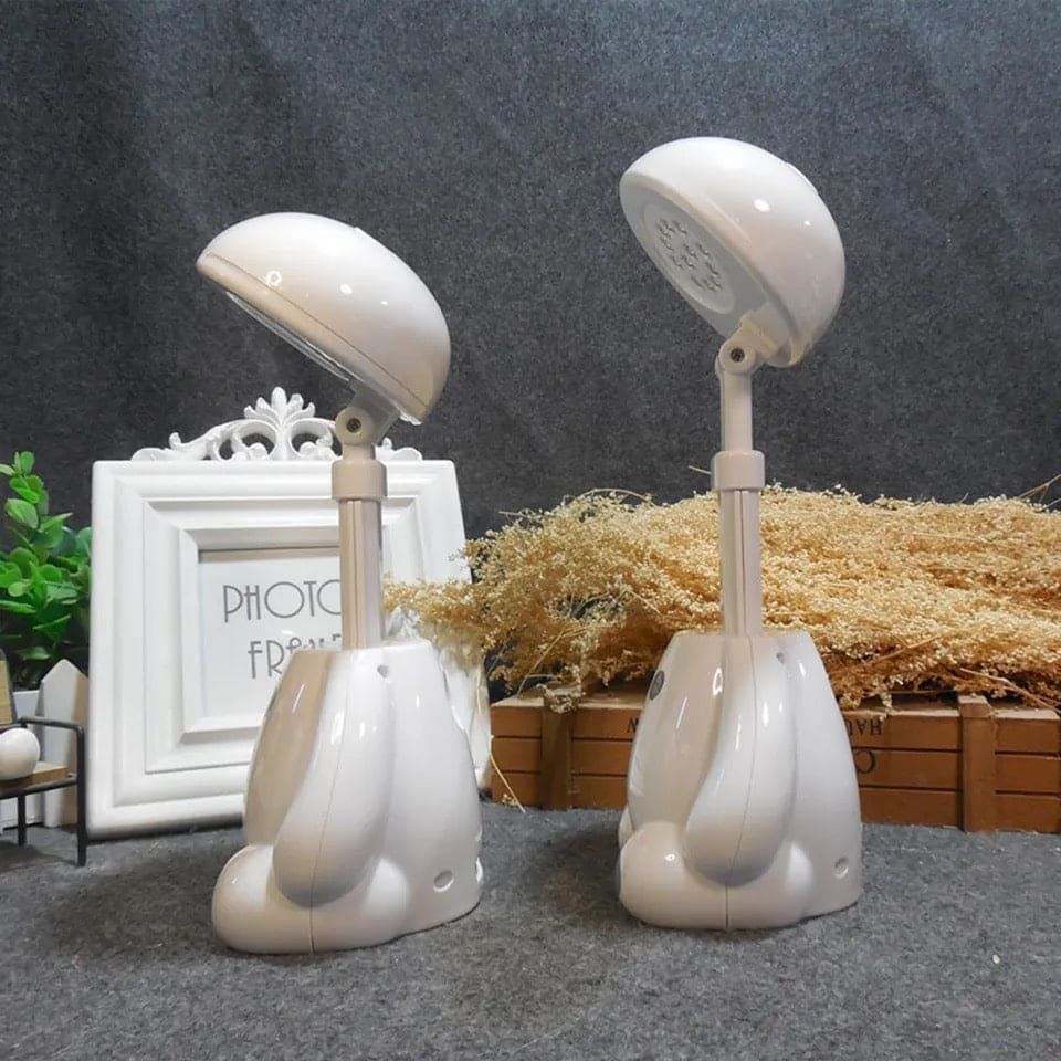 Clarify.pk rechargeable study lamp with eye protection in white shown with adjustable head and base