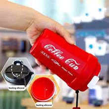 Red leakproof thermos coffee mug being poured with black coffee showing sealing silicone lid by Clarify.pk