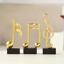 Resin musical note decor 3 pieces set in gold finish on black bases perfect for home decoration