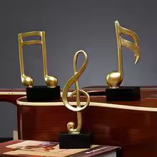 Clarify.pk resin musical note decor 3 pieces set with gold finish on black bases for home decoration