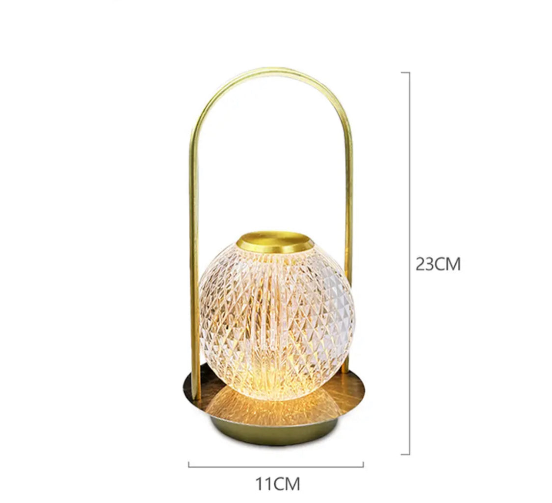 Elegant retro metal table lamp with glass globe shade and brass finish measuring 23 cm height and 11 cm width