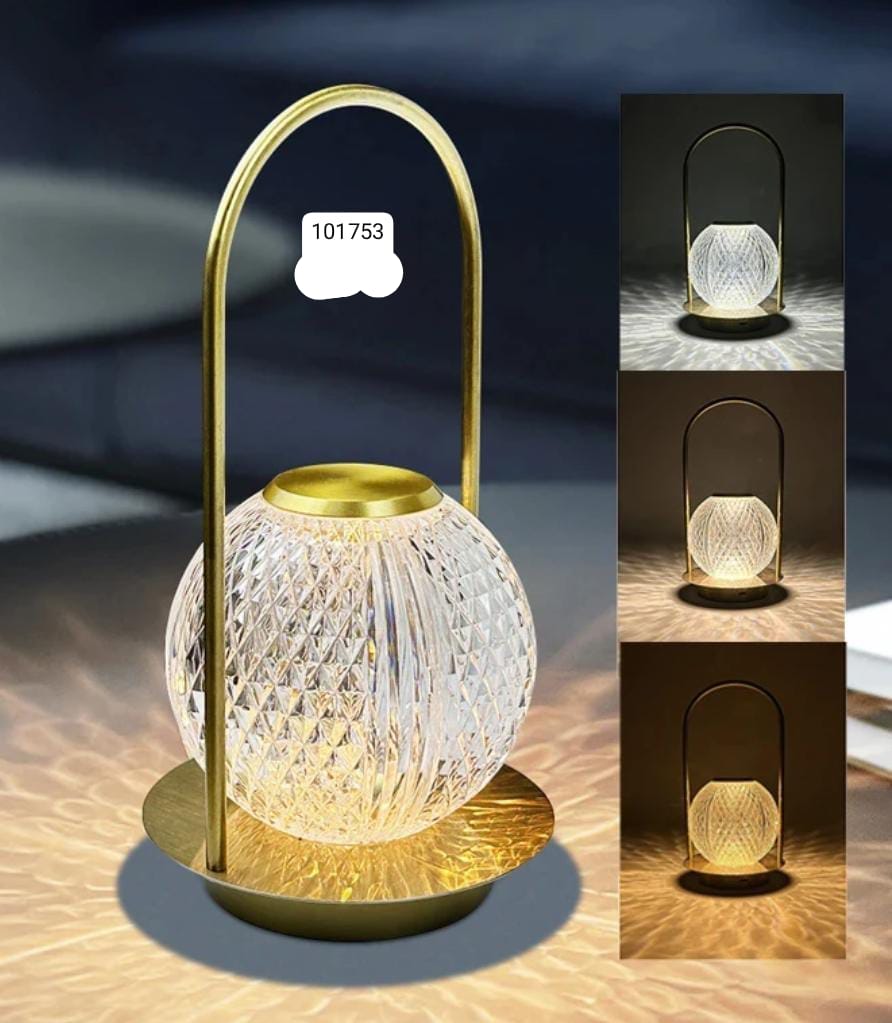 Retro metal table lamp with a decorative glass globe and brass finish base by Clarify.pk