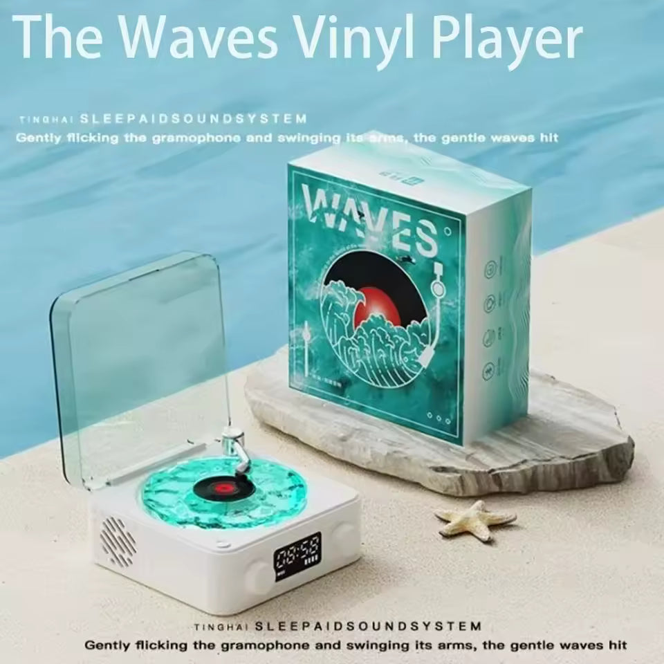 Clarify.pk retro turntable Bluetooth speaker with waves vinyl player design placed on beach sand