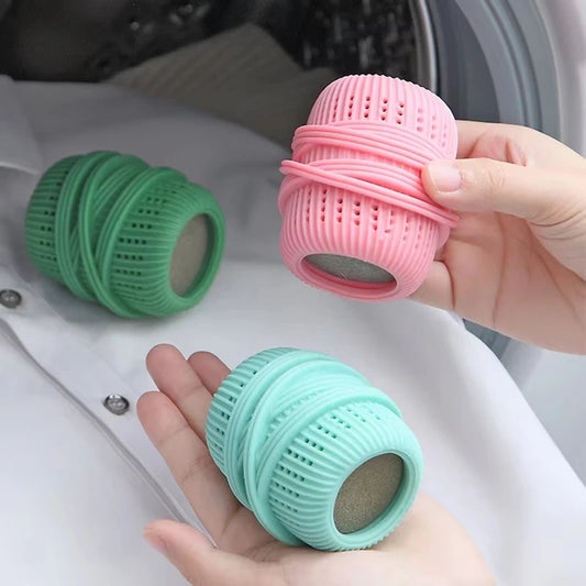 Clarify.pk reusable laundry dryer balls in pink green and blue for efficient and eco friendly laundry drying