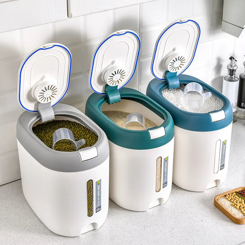 Set of three rice storage container with airtight lid in white with gray and teal accents on kitchen counter