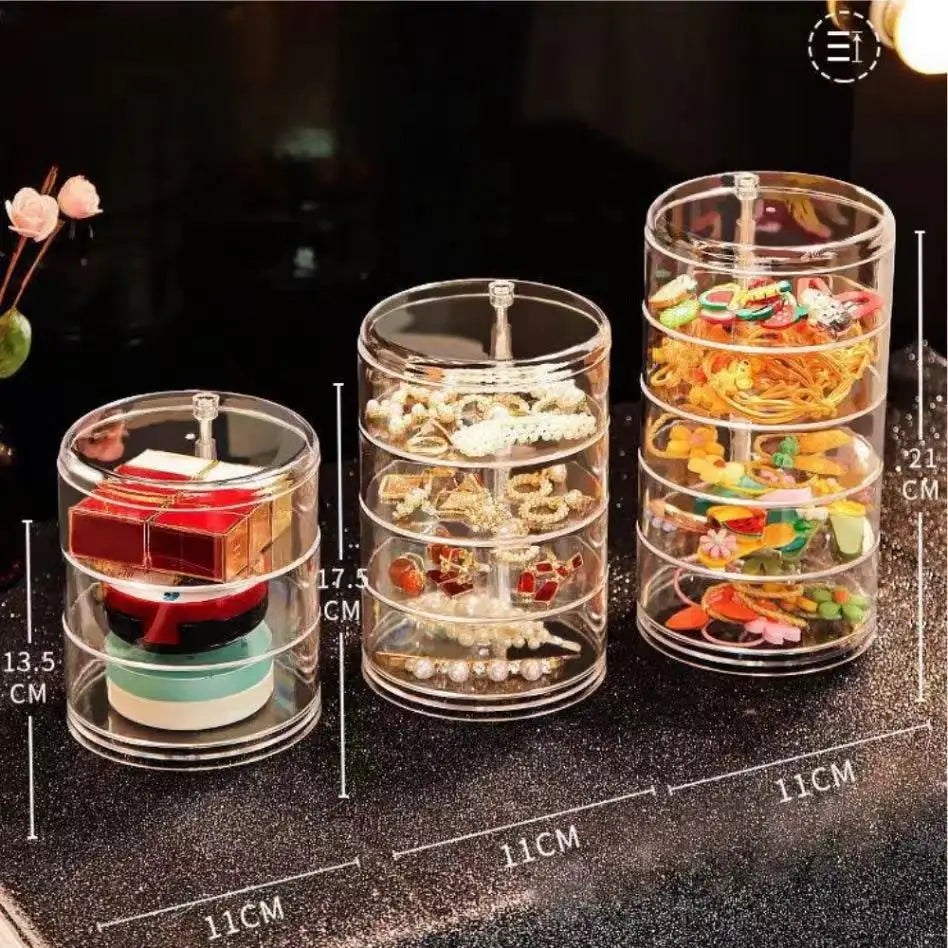 Clarify.pk rotating jewelry storage box with clear cylindrical compartments for organizing rings earrings and bracelets