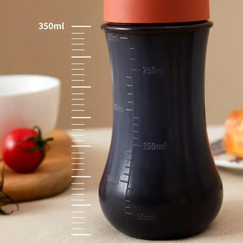 Clarify.pk 350ml sauce squeeze bottle in black with measurement markings for precise pouring