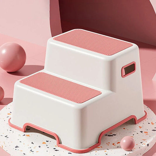 White and pink non-slip step stool for bathroom with two steps and side handles