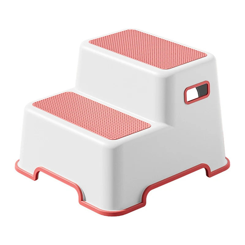 White and pink non-slip step stool for bathroom with two steps and side handle for easy carrying