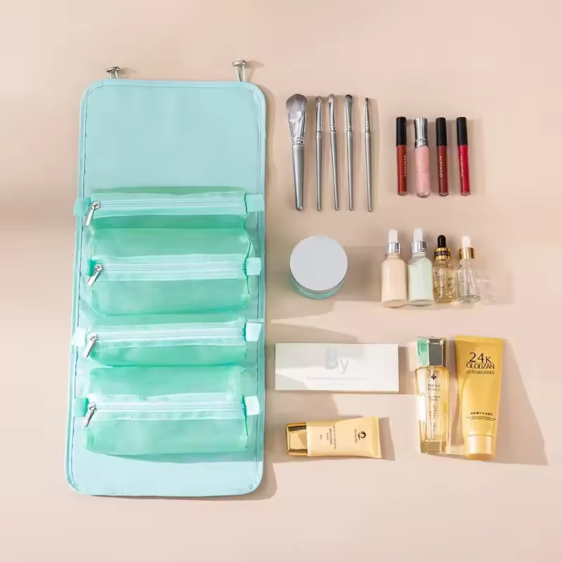Light blue detachable hangable toiletry bag with multiple compartments and various makeup tools and cosmetics