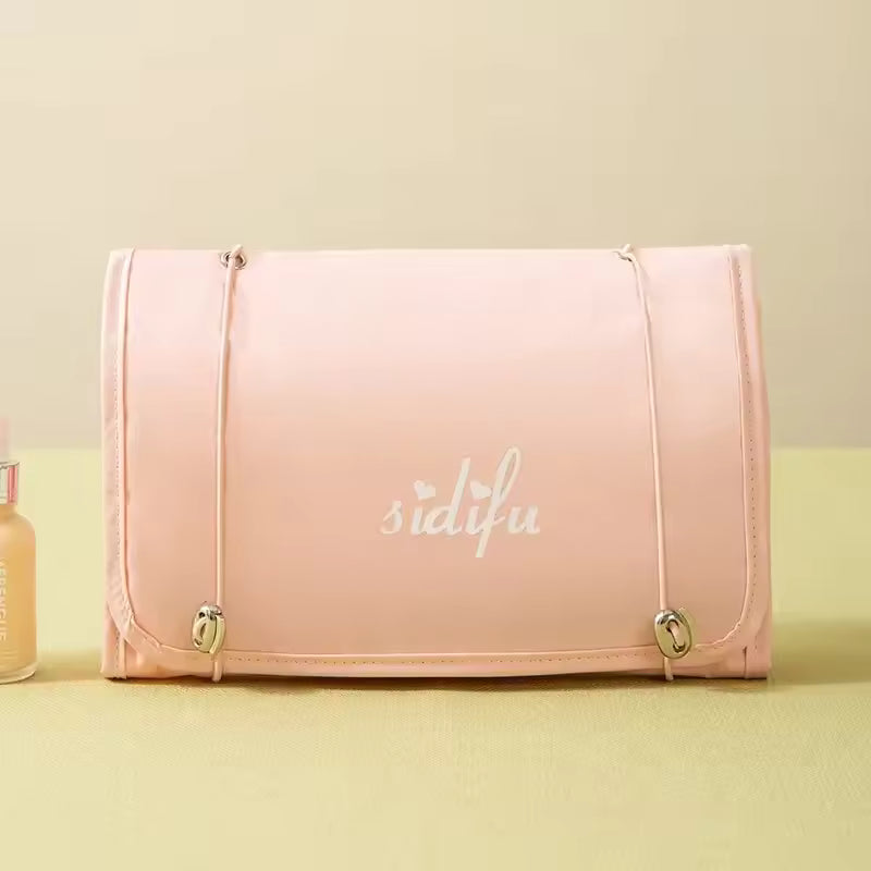 Clarify.pk pink detachable hangable toiletry bag with secure elastic straps and compact design