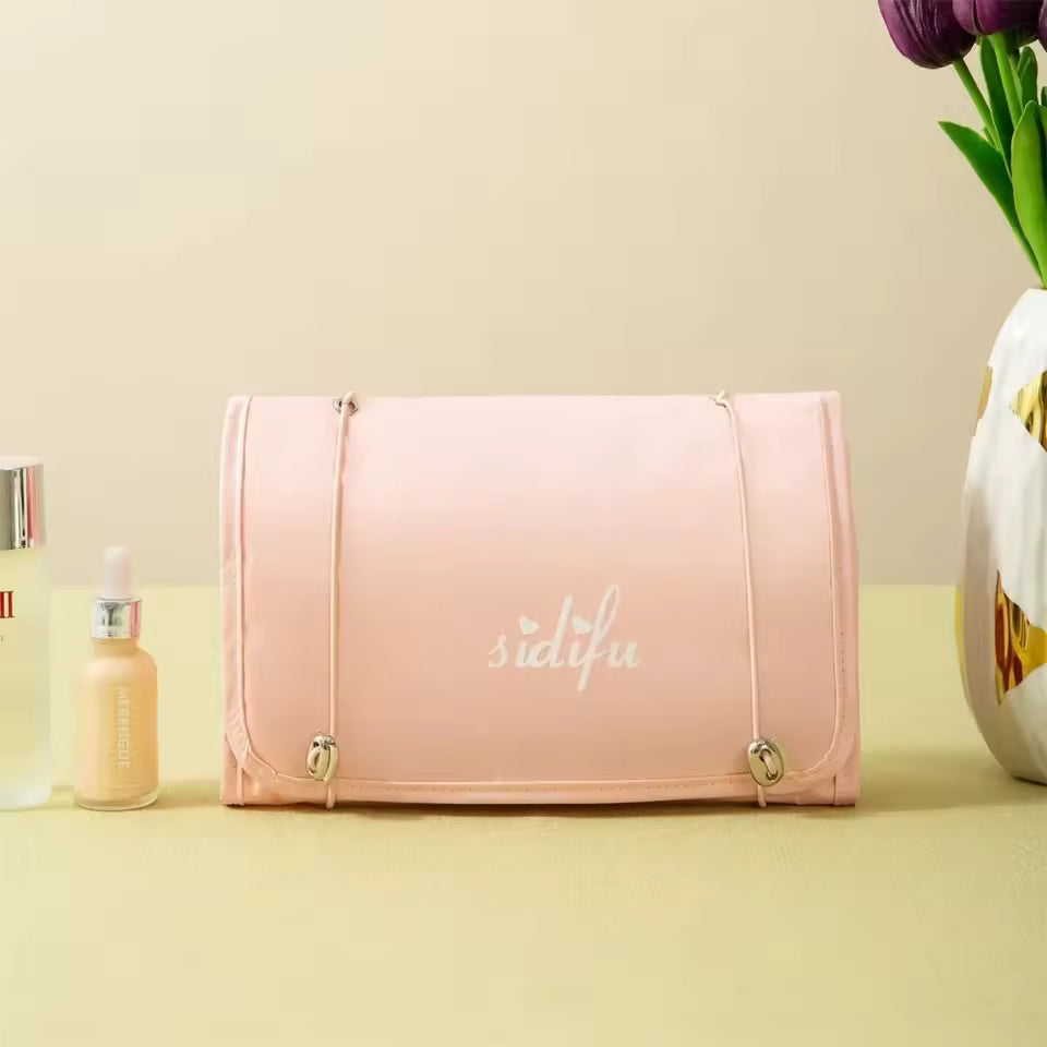 Pink detachable hangable toiletry bag by Clarify.pk with compact design for travel and organization