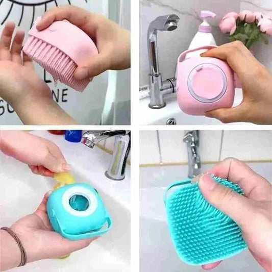 Silicone baby bath brush in pink and blue colors showing soft bristles and ergonomic design for gentle baby bath use