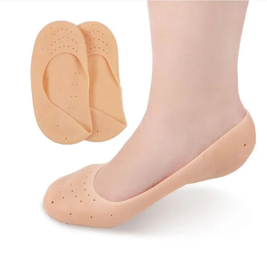 Clarify.pk silicone heel socks for cracked heels in beige, worn on foot with breathable holes