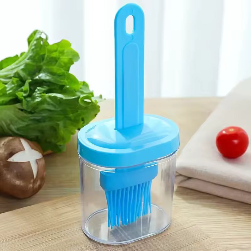 Blue silicone oil brush for baking with clear container for easy oil storage and application