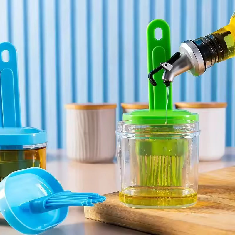 Clarify.pk silicone oil brush for baking with green and blue handles in clear oil containers