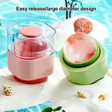 Silicone sphere ice mold with easy release and large diameter design in pink and green colors